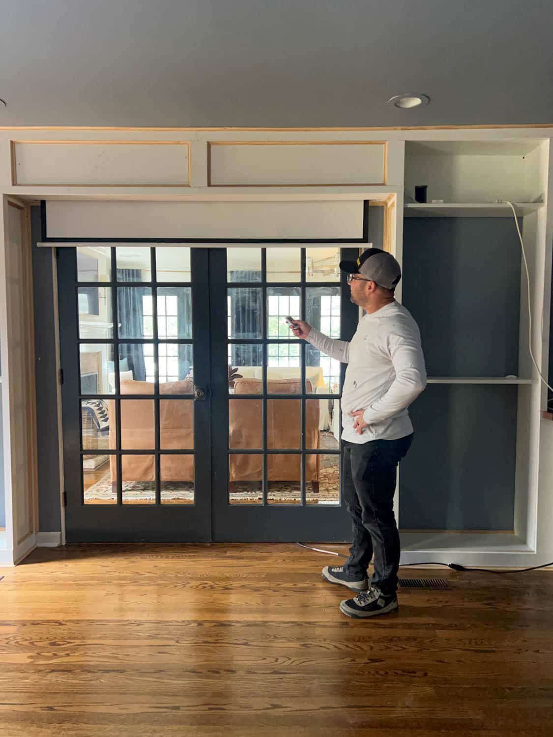 electric projector screen with remote hidden in built ins