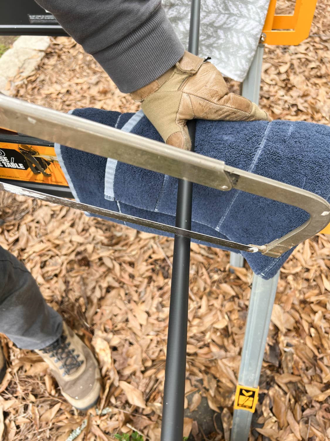 cutting new stair balusters with a hack saw