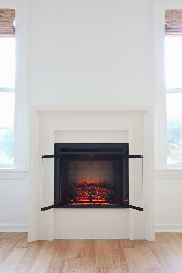 electric fireplace diy flanked by windows
