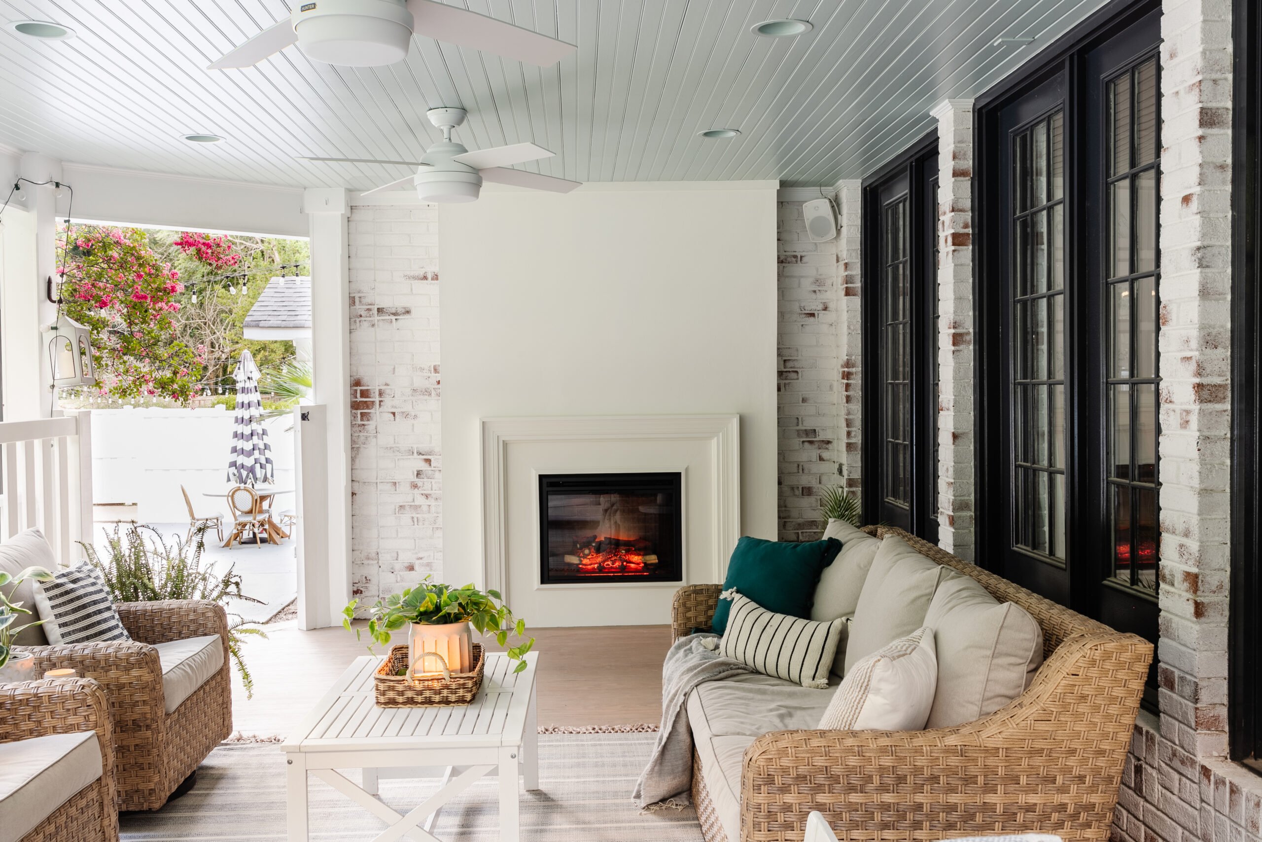 porch fireplace limewashed brick and haint blue ceiling