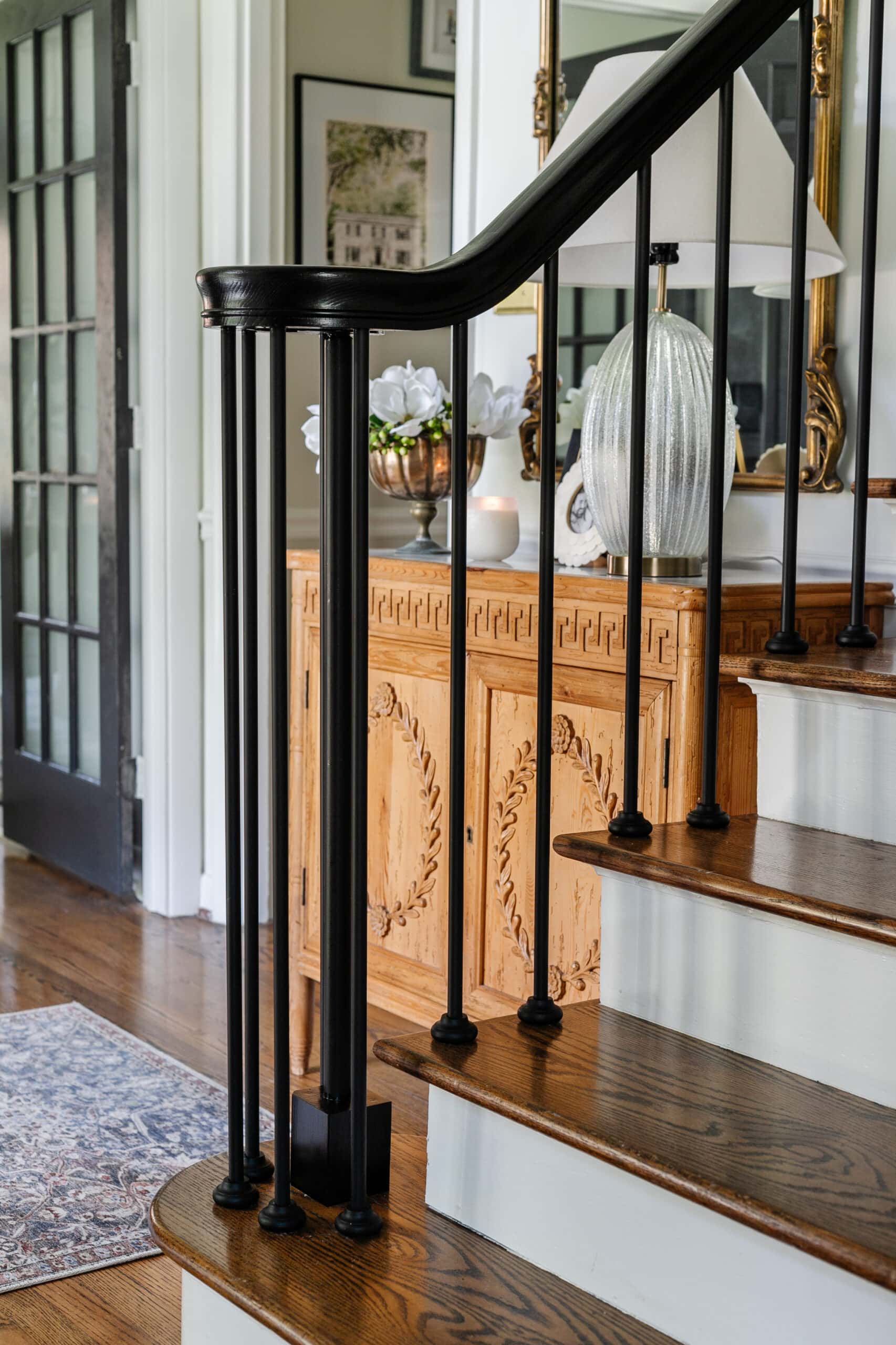 newly replaced stair balusters in railing