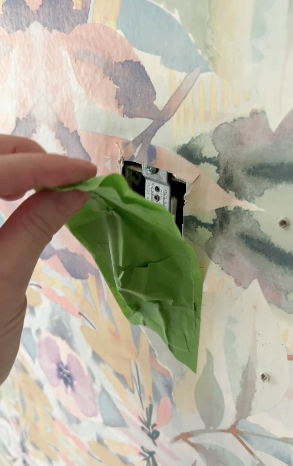 covering outlets before wallpaper removal to protect wires