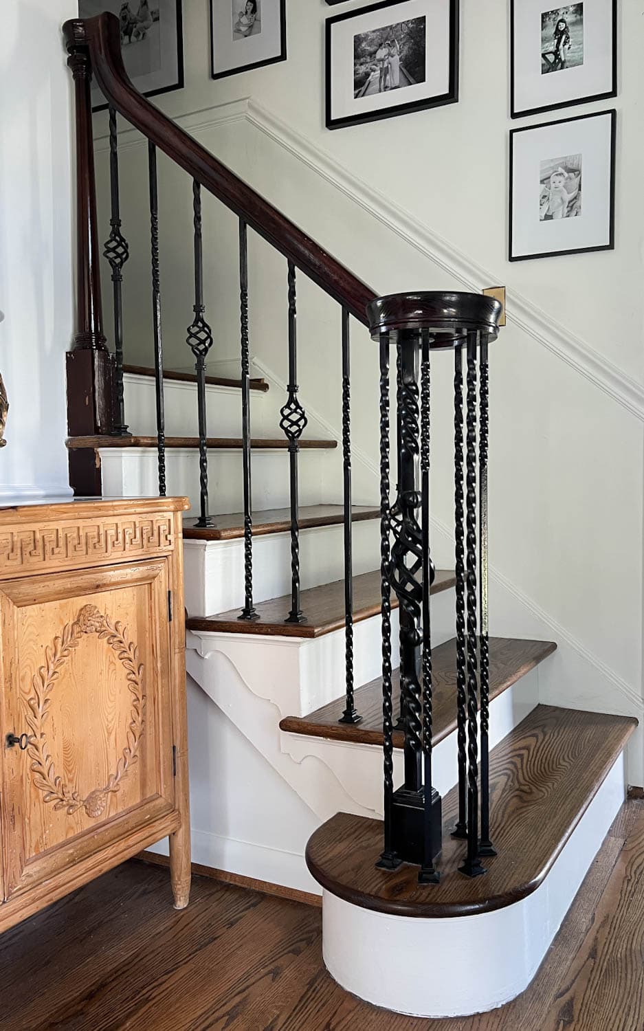 twisted iron balusters on a railing before makeover