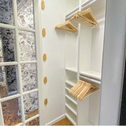 IKEA Closets Using Billy Bookcases | A step-by-step tutorial and budget breakdown for using IKEA Billy bookcases to customize his & her closets in a master bedroom.