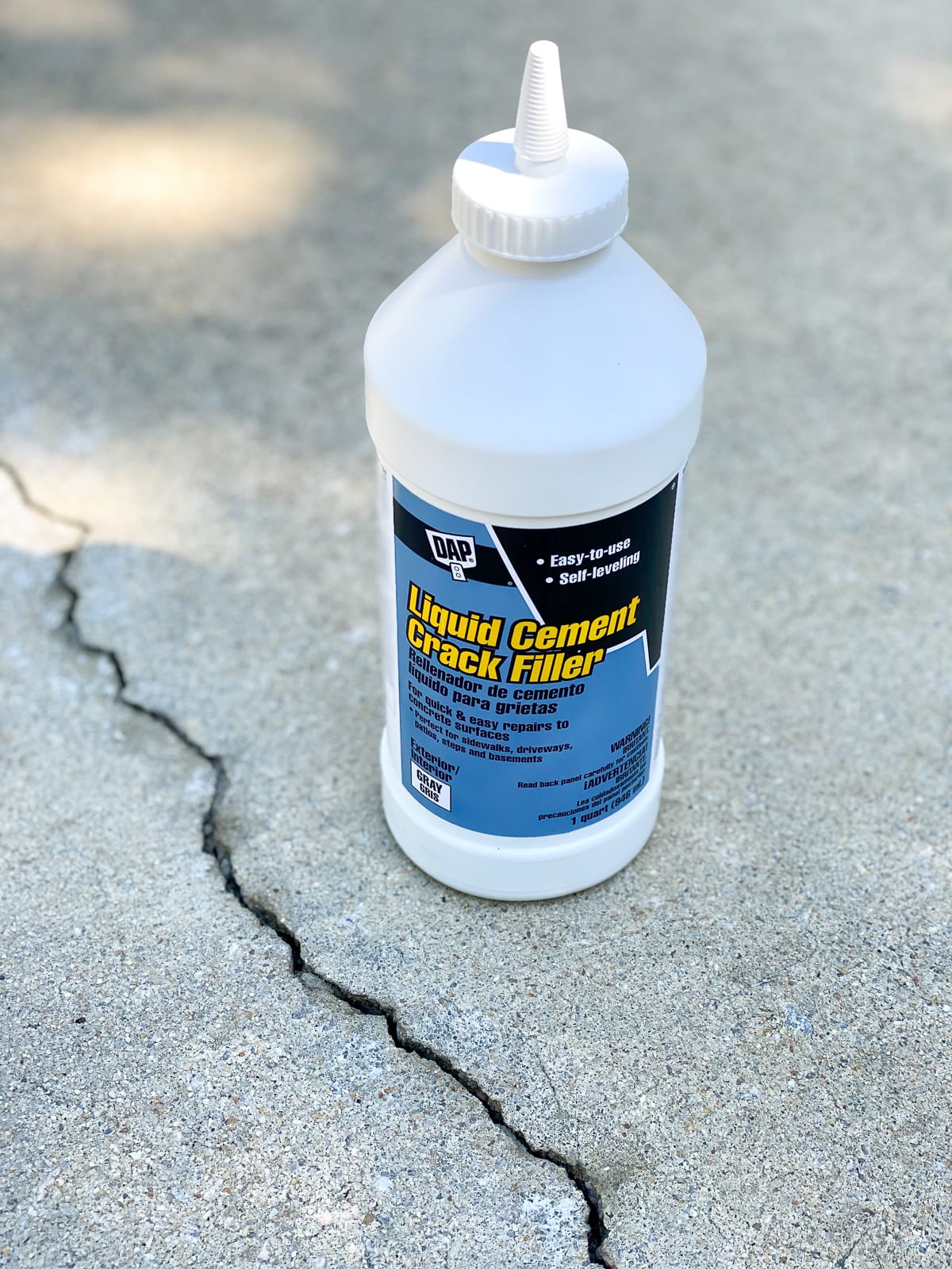 liquid cement crack filler to prep a concrete pool deck for paint
