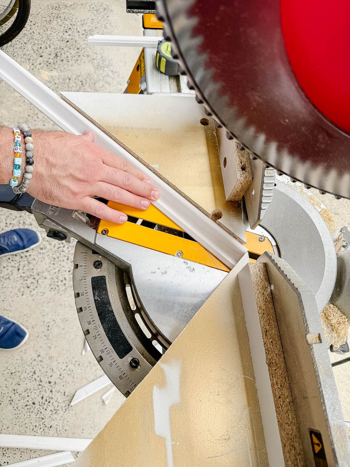 DIY angle cutting guide on a miter saw for wainscoting