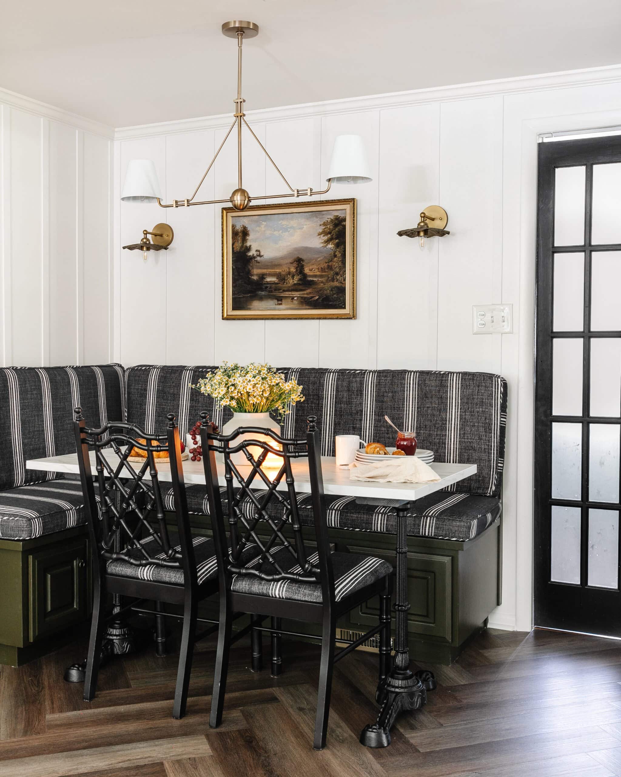 breakfast nook with banquette and DIY faux marble dining table